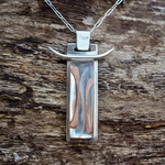 Allison Sponhaltz: Suspended Copper and Fiber Pendant in Sterling Silver