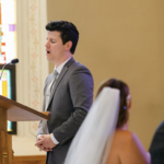 Nick Cosgrove: Nick_Cosgrove_Singing_At_A_Wedding_Ceremony.png